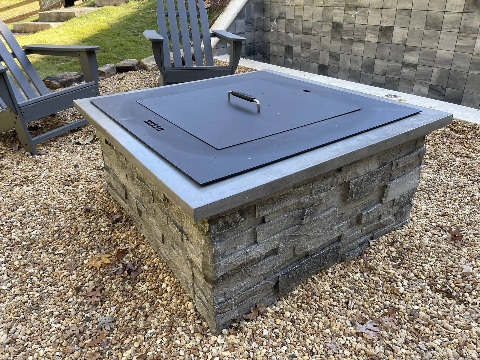 Stone fire pit at dusk