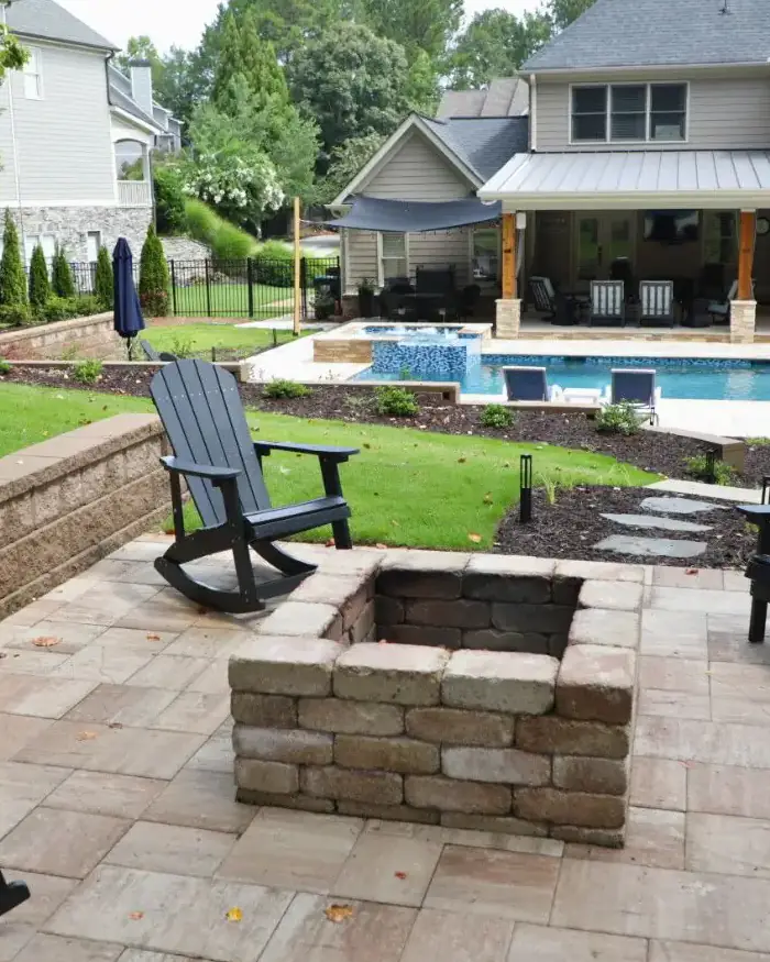 Acworth RutherfordMade paver patio and fire pit integrated with the pool area